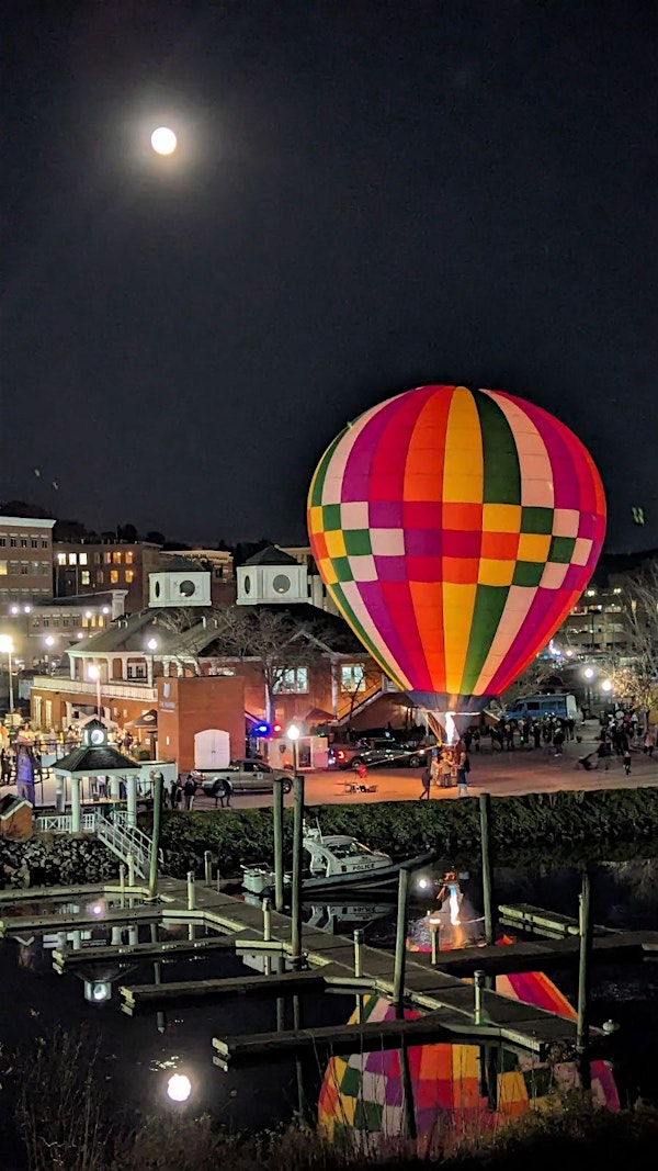 The enchanting Harbor Glow lights up The Marina at American Wharf.